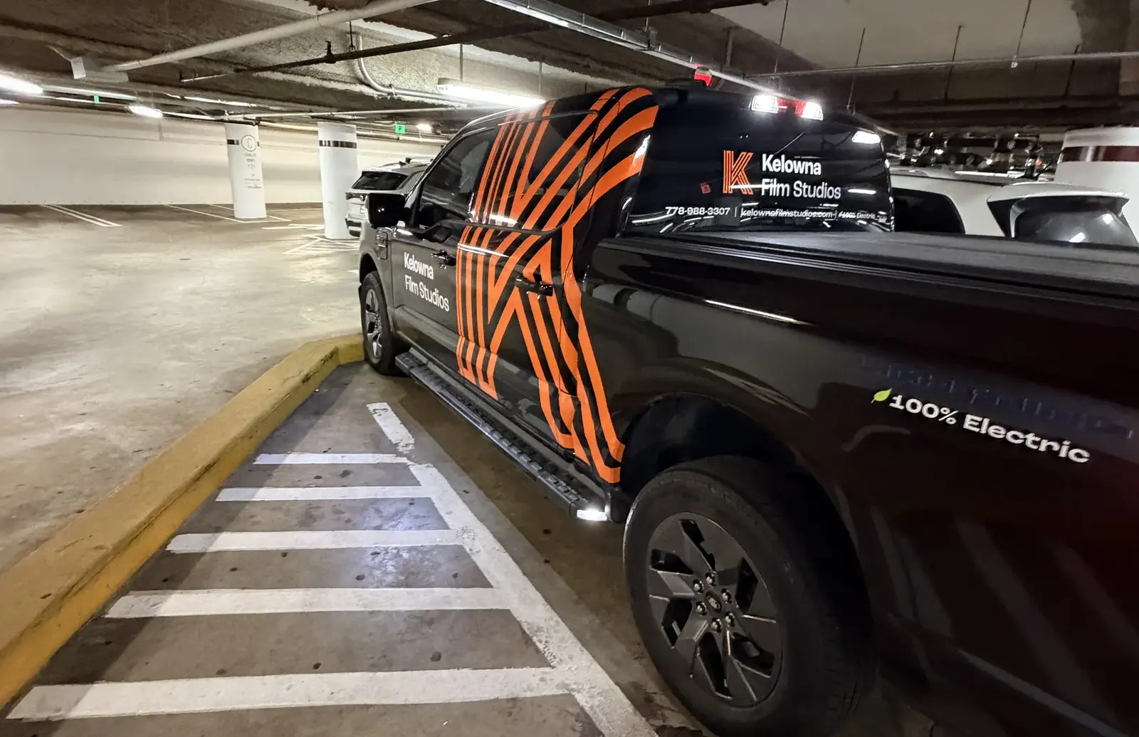 Kelowna Film Studios wrapped electric truck parked in Vancouver during the Leo Awards trip
