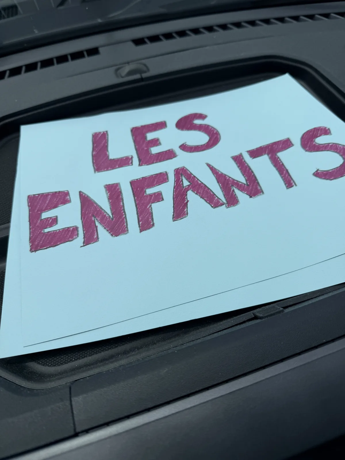 Les Enfants sign photographed during the Airbnb campaign coordination