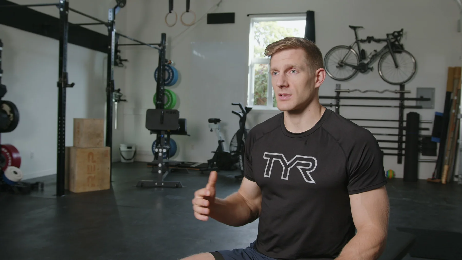 Brent Fikowski seated for an interview in his training space during ABC field production