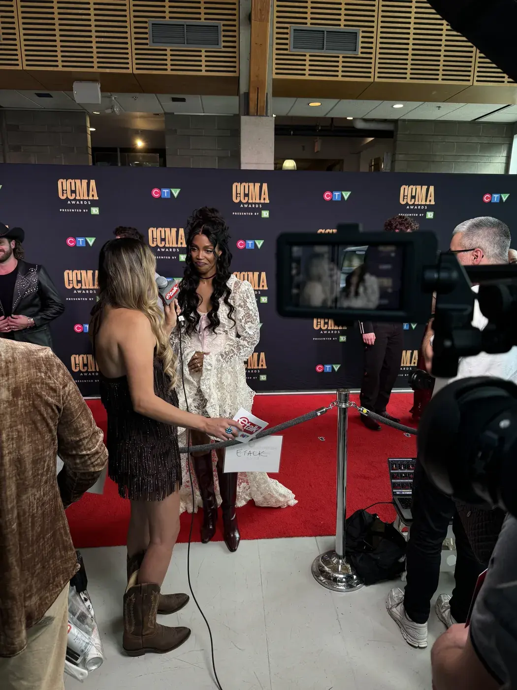 eTalk interview on the CCMA red carpet with CTV and CCMA logos in the background