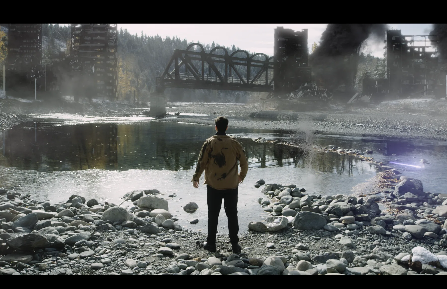 Actor overlooking a river and bridge in Princeton