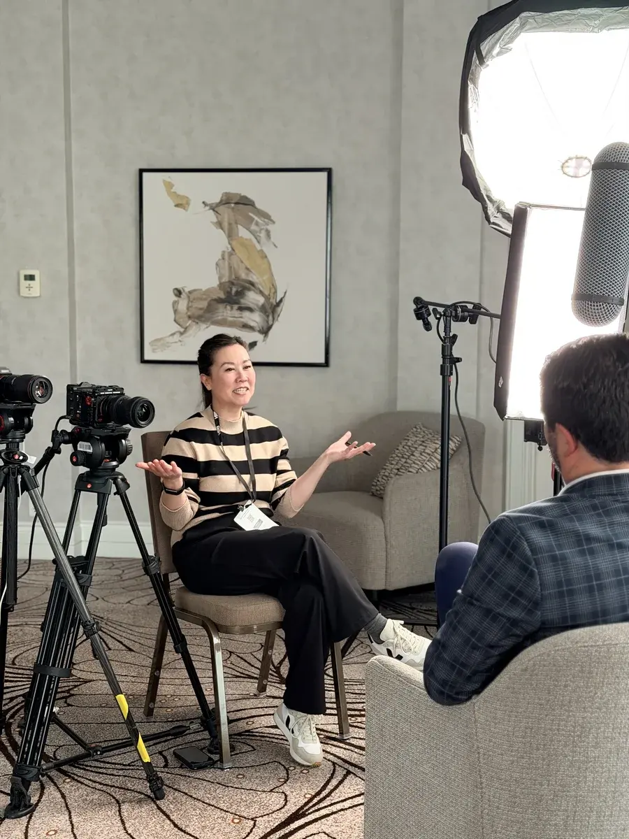 Camera angle on a SandBay Entertainment conference interview subject