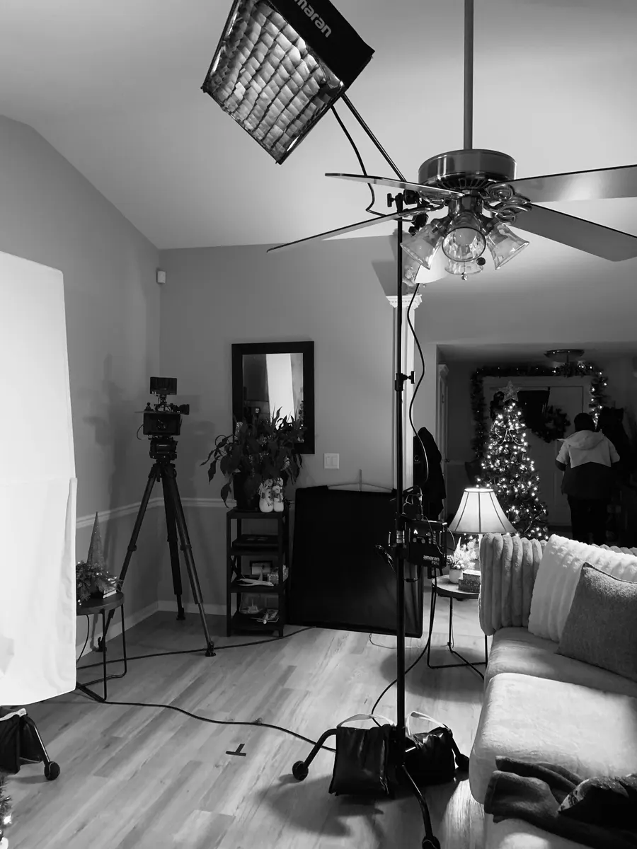 Camera, light stands and negative fill inside The Letter set